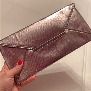 Rose gold BCBGMAXAZTIA clutch